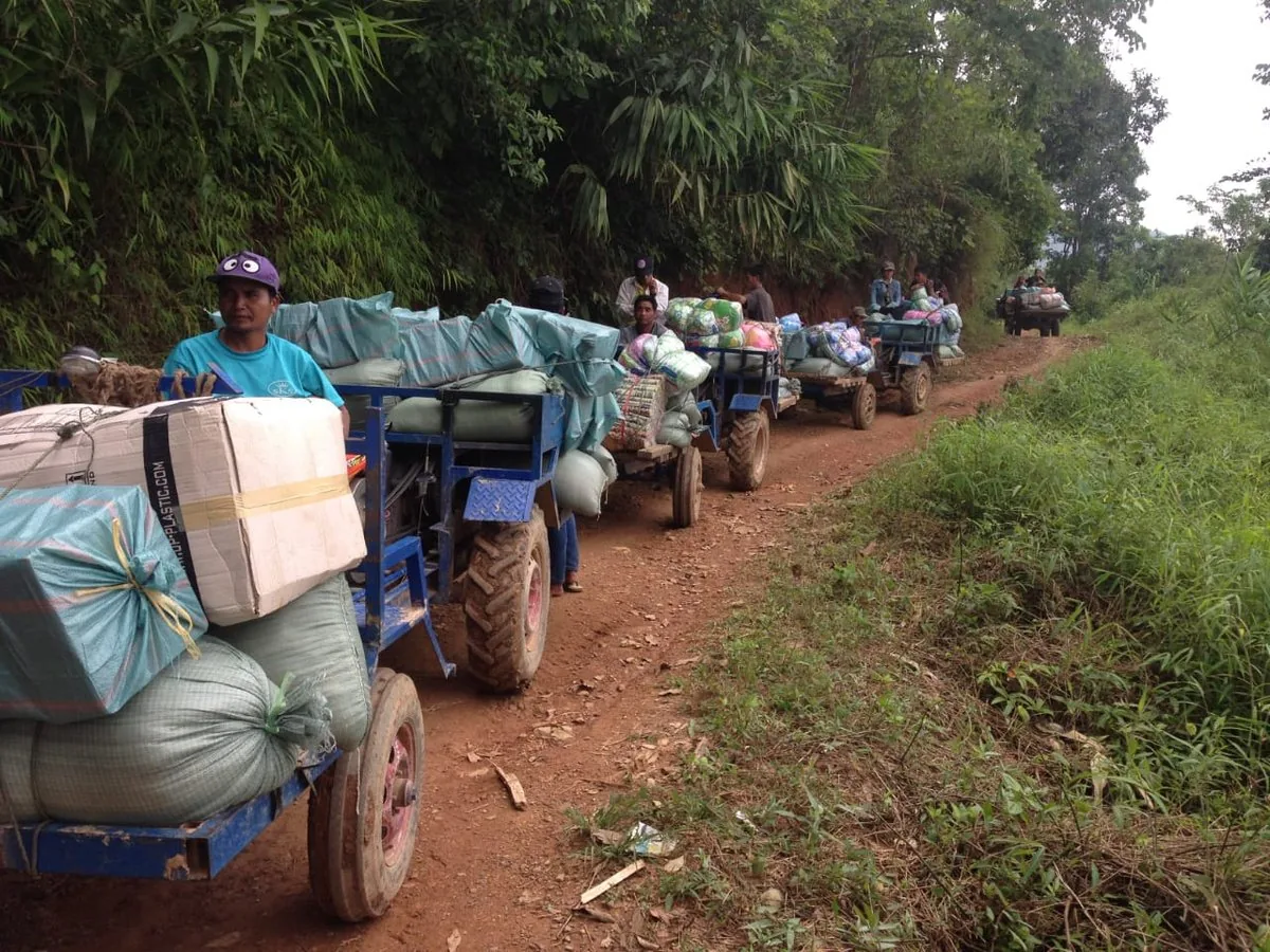 Asia Eco Farm founder distributing aid to Laos village families — CSR charity July 2023